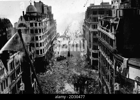 Following an air raid on London during the Blitz German bombing ...