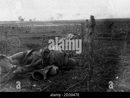 French soldiers, having passed beyond the barbed wire, lying dead near the German lines, during the First World War c.1915. Picture part of PA First World War collection. Stock Photo