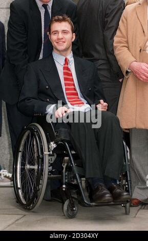 Ben Smoldon, who was paralysed when a scrum collapsed during a rugby game, outside the Old Bailey after winning damages from match referee Michael Nolan after successfully claiming that he was negligent. His claim against an opposing player was rejected.   * Opposing player - Thomas Whitworth. Referee  found negligent in his handling of the game. 8/3/99: Receives 1.95 million-pounds from the Rugby Football Union in an out-of-court damages settlement. Stock Photo