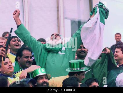 Pakistani fans in a carnival mood at the Oval cricket ground in London during the World Cup cricket Super Six match between Zimbabwe and Pakistan. Stock Photo