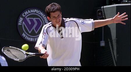 No Commercial Use. British tennis star Tim Henman in action during his quarter final match against Cedric Pioline of France at Wimbledon. Stock Photo
