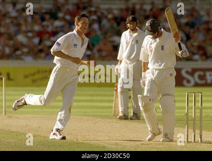 England captain Nasser Hussain leaves the field after being