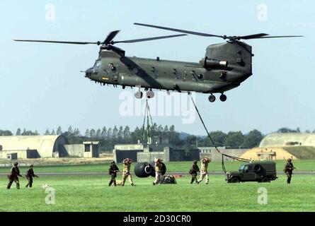 Part of the air display during the launch of the Sixteenth Air Assault Brigade, at RAF Wattisham, Suffolk. The demonstration was watched by the Prince of Wales and his son's, Prince's William and Harry. * 15/8/01: The Air Assault Brigade's members are expected to be amongst the forward elements of a NATO force that may be deployed in Macedonia, as early as the weekend. The UK could send 350 to 400 troops in advance of a NATO force of 3,500 soldiers to underscore a peace deal in the former Yugoslav republic and collect arms from the ethnic Albanian rebels who have waged a six month insurgency Stock Photo