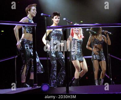 The Spice Girls in concert at the Manchester Arena, on the first night of a four night engagement. (left to right) Sport Spice, Mel C, Posh Spice, Victoria Adams, Baby Spice, Emma Bunton and Scary Spice, Mel G. Stock Photo