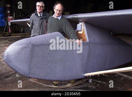 Bill Goldfinch (L), a former Colditz inmate, with Mike Fripp from the Southdown Aero Services, whose company built the replica escape glider, at RAF Odiham base in Hampshire. PoW's at the German castle prison built the original glider using floorboards.  * ...and sleeping bags for an escape attempt. The plane never took to the skies after British escape officers ordered the delay of the launch in April 1945 in case the SS ordered a massacre of escapees. Both glider, builders and former inmates got together at the air base for a Channel 4 documentary. Stock Photo