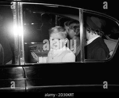 Prince Andrew raises his hand in a wave shortly after arrival at King's Cross Station, London, from Aberdeen. Stock Photo