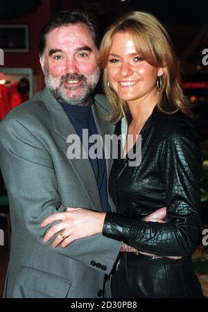 PA Library photo dated 1/5/1996 Soccer legend George Best with his wife Alexandra.  George Best was in hospital tonight, Thursday 9th March 2000, after suffering stomach pains.  His personal assistant Philip Hughes said the former Manchester United idol was spending a second night in the Cromwell Hospital, west London where tests were being carried out. He confirmed a story in tomorrow's edition of The Sun newspaper that Best is unwell. But he denied a suggestion that one of soccer's greatest names was fighting for his life. See PA story Health Best. PA Photo : Fiona Hanson Stock Photo