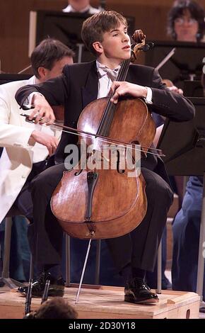 18 year old Guy Johnston plays his Cello on the way to winning the BBC Young Musician of the Year 2000 competition, at the Bridgewater Hall in Manchester. One of Guy's strings broke at the start of his performance but he managed to keep his composure.  * ...changing the string and carrying on to win. Stock Photo