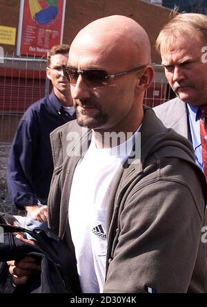 France's World Cup-winning goal keeper Fabien Barthez leaves Old Trafford, Manchester after undergoing negotiations with Manchester United today. The player underwent medical tests at a clinic earlier in the day. Stock Photo