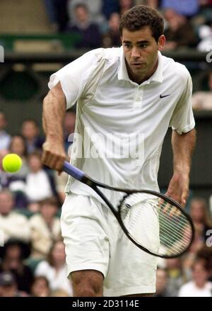 NO COMMERCIAL USE:  America's Pete Sampras in action against Karol Kucera of Slovakia during the Lawn Tennis Championships at Wimbledon Stock Photo