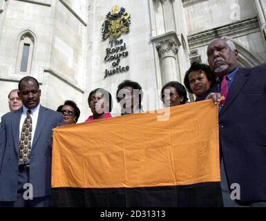 Indian Ocean islanders, known as Ilois, outside the High Court, London, who, it was claimed, were banished from the Chagos archipelago between 1967-73 amidst a 'very sad and discreditable Cold War cover-up' by the British government.   * Sir Sydney Kentridge QC, appearing for many islanders who now want to return home, said up to 2,000 Ilois were forced out so that the British could fulfil an agreement with the US, allowing the Americans to build a strategically important air and navel base on Diego Garcia.  Stock Photo