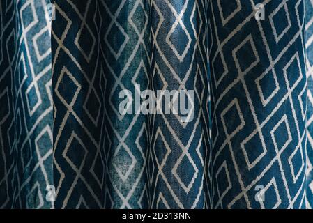 material textile background. Blue fabric in diamonds. Close-up of the white blue diamond shaped fabric textile texture Stock Photo
