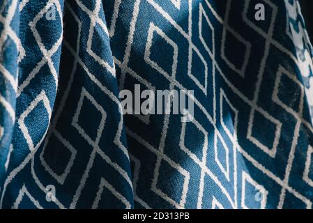 material textile background. Blue fabric in diamonds. Close-up of the white blue diamond shaped fabric textile texture Stock Photo
