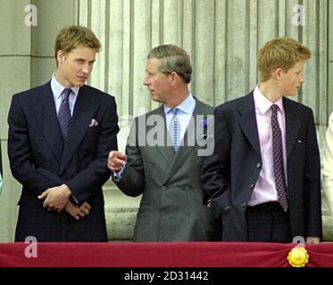 (L-R) Prince William, Prince of Wales and Prince Harry on the balcony of Buckingham Palace, during  Queen Elizabeth, The Queen Mother 100th Birthday celebrations in London.  Stock Photo