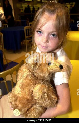 7-year-old Kerrie Keep from Maidstone, Kent holds the world's oldest teddy bear, a Steiff PB28 dating back to 1904. The antique teddy is on display at Hamleys Toy shop in London, accompanied by its younger brother, a prototype black Steiff bear from 1907.  *... never before seen outside Germany. The bears, which were all made in the Steiff factory in Giengen, Germany, can fetch thousands at auction. Stock Photo