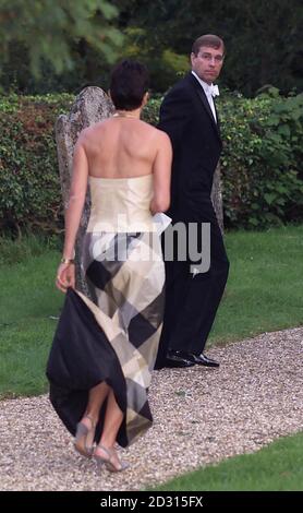 Ghislaine Maxwell with the Duke of York leaves the wedding of a former
