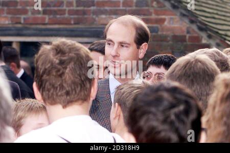 HRH The Duke of Wessex meets with school children during a visit to Sussex. The Duke listened to residents speak about recent floods in the Uckfield, area when the River Uck burst its banks flooding many houses and shops. Stock Photo