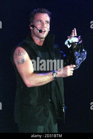 J (Jason Brown) from the boy band 'Five' performing on stage at Wembley Arena, London. Stock Photo