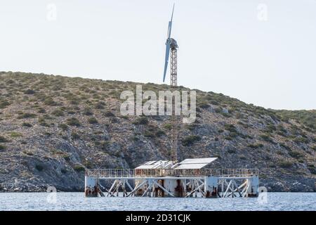 Solarwind power production on a floatable construction at Iraklia,Cyclades,Greece Stock Photo
