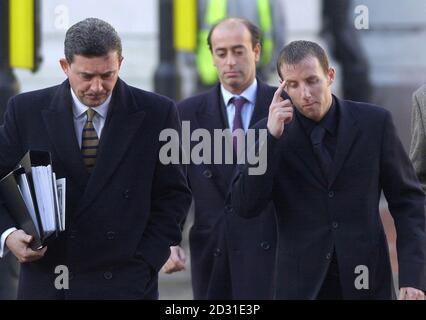 Leeds United footballer Lee Bowyer (right) arrives with his legal team at Hull Crown Court, where he is charged with assaulting a student in Leeds city centre in January last year.   *...The trial of Bowyer and five other men is due to last up to six weeks and the first week is expected to be taken up with legal argument.   Stock Photo