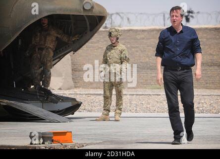 Prime Minister David Cameron arrives by helicopter in Lashkar Gah in Helmand Province, Afghanistan where he met British soldiers and held talks with heads of the Afghan National Army and police force. Stock Photo