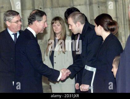 The Prince of Wales (2nd left) with two survivors of the Selby rail crash GNER staff Emma Kirvan-Taylor, 25 (centre) and Philip Robinson, 24, (crutches),  at York Minster in a private meeting after a memorial service for victims of the tragedy.  * Two thousand people attended including the deputy prime minister John Prescott, passengers injured in the tragedy, representatives of rail companies and emergency service personnel who worked at the scene of the disaster. Ten people were killed when a GNER passenger train collided with a freight train near the village of Great Heck on 28/02/01. Stock Photo