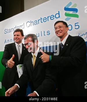 Group Executive Director of Standard Chartered Plc Kai Nargolwala (C), CEO of Standard Chartered Bank (Hong Kong) Limited Peter Sullivan (L), and Chief Financial Officer of Standard Chartered Bank (Hong Kong) Limited Julian Fong attend a news conference for the 2005 annual results in Hong Kong March 2, 2006. Asia-focused bank Standard Chartered Plc just topped analysts' forecasts with a 19 percent rise in yearly pretax profit, fuelled by its biggest ever acquisition and presence in to fast growing Asian markets. REUTERS/Paul Yeung