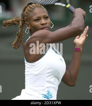 NO COMMERCIAL USE: USA's Serena Williams in action against Barbara Ritner of Germany during the Second Round match of the 2001 Lawn Tennis Championships at Wimbledon, London. Stock Photo