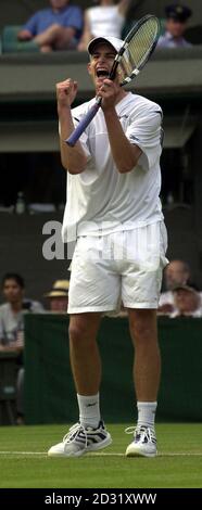 NO COMMERCIAL USE: USA's Andy Roddick celebrates beating Thomas Johansson of Sweden in their Second Round match of the 2001 Lawn Tennis Championships at Wimbledon, London. Stock Photo