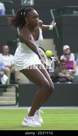 NO COMMERCIAL USE: USA's Venus Williams in action against Daniela Hantuchova during the Second Round match of the 2001 Lawn Tennis Championships at Wimbledon, London. Stock Photo