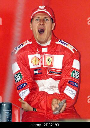 Ferrari's Michael Schumacher relaxes, during the qualifying session at Silverstone. Stock Photo