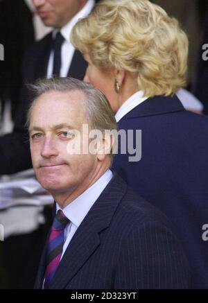 Disgraced former Conservative MP Neil Hamilton and his wife Christine (back) arrive at Westminster Catherdral central London for the funeral of Lord Longford, the Labour peer and penal reformer who died last week aged 95, at the Chelsea and Westminster hospital.  *  The requiem mass for Lord Longford, who was  born as Francis Aungier Pakenham, the 7th Earl of Longford, will be led by the Archbishop of Westminster, Cardinal Cormac Murphy-O'Connor. Lord Longford,  attracted criticism for his long fight on behalf of Moors Murderer Hindley but campaigned on a host of other issues. nnch Stock Photo