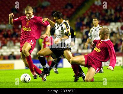 Liverpool's Steven Gerrard (right) and Danny Murphy gets away from Pedro Emanuel of Boavista during the UEFA Champions League Group B game between Liverpool and Boavista, at Anfield, Liverpool. ALSO RUNNING ON THE PA WIRE. THIS PICTURE CAN ONLY BE USED WITHIN THE CONTEXT OF AN EDITORIAL FEATURE. NO WEBSITE/INTERNET USE UNLESS SITE IS REGISTERED WITH FOOTBALL ASSOCIATION PREMIER LEAGUE.  Stock Photo