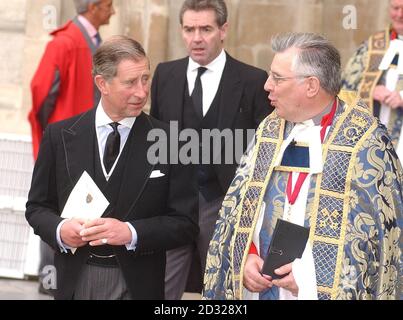 The Prince of Wales talks to the Dean of Westminster Abbey, Dr Wesley Carr after a service of thanksgiving at the Abbey in London celebrating the life of comic Sir Harry Secombe. The Goon Show legend died in April from cancer at the age of 79. * He will be remembered by family and friends at the event. The Prince of Wales was among The Goons' most prominent fans and led the tributes following his death. Sir Harry was also known for his fine tenor singing voice which he used to great effect on the religious TV programmes he presented, such as Highway and Songs Of Praise. He had battled against Stock Photo