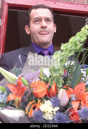 Ex Royal Butler Paul Burrell 43 Opened Paul Burrell Flowers And Gifts In The Centre Of The Village Of Holt Near Wrexham Burrell Enlisted The Help Of Drag Artist Danny La Rue To Kick Start His New Career As A Florist And Cut The Opening Ribbon To The Shop