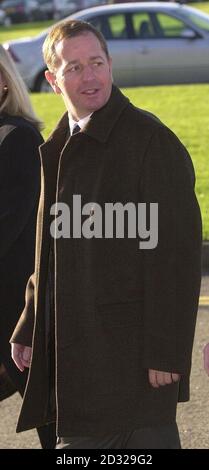 Formula One commentator and former racing driver Martin Brundle arrives at the service of thanksgiving held for the life of Formula One Team boss Ken Tyrrell at Guildford Cathedral. Stock Photo