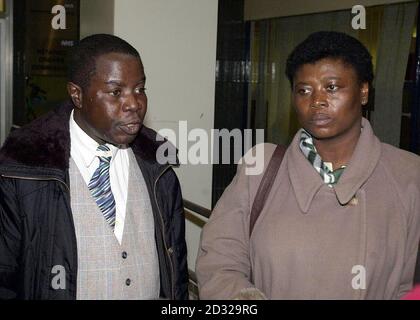 Francis and Berthe Climbie arrive, at the London Inquiry into the death of their eight-year-old daughter Victoria, who was murdered last year at the hands of her Aunt Marie-Therese Kuauo and  her partner Carl Manning.  *..,  both were jailed for life last January for Victoria's murder.  Both Victoria's  parents today welcomed plans to make the killers of their child give evidence at the inquiry into her death. Stock Photo