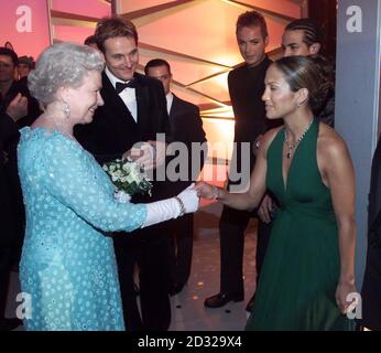 British Queen Elizabeth II meets American singer / actress Jennifer Lopez backstage at the Dominion Theatre in London after this year's Royal Variety Performance.  Stock Photo