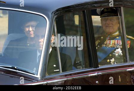 Queen Elizabeth II riding with the Duke of Edinburgh as they return from Westminster Hall where Queen Elizabeth, Queen Mother will lie in state until her funeral. Stock Photo