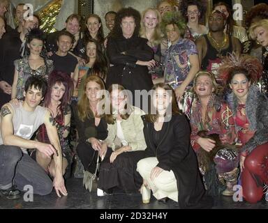 The Duchess of York (3rd left, bottom row) with her daughter's Princess Beatrice (4th left, bottom row), Princess Eugenie (5th left, bottom row) with Brian May (behind Beatrice) the guitar player with rock supergroup Queen, at the Dominion Theatre in London.  * ...  The Duchess and her daughters were at the Theatre to see the musical 'We will rock you', based around the greatest hits of the British band during their most popular period, later meeting the cast on stage. Stock Photo