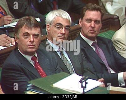Government Ministers Andrew Smith (Work and Pensions), Alistair Darling (Transport) and Alan Milburn (Health) listen to British Chancellor of the Exchequer Gordon Brown in the House of Commons in, where he outlined his Comprehensive Spending Review.   * Education will get the main share of his  90 billion package, with the Home Office, Defence, Overseas Aid and Transport all sharing in the spending boost. Stock Photo