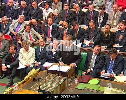 EDITORIAL USE ONLY : MPs and Ministers listen as British Prime Minister Tony Blair addresses the House of Commons which had been recalled from the summer recess for an all-day debate on Iraq.    *  Earlier, the government had published a dossier of evidence on Iraqi dictator Saddam Hussein's weapons of mass destruction programme. Stock Photo