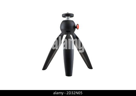 Black tripod isolated on a white background, mini tripod for DSLR camera, close-up photo Stock Photo
