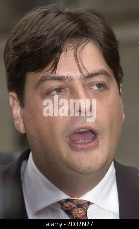 Former MI5 employee David Shayler talks to the media outside the Old Bailey in central London for the first day of the trial where is being taken to court by the British government under the Official Secrets Act.   05/11/02 : David Shayler, 36, who is facing a prison sentence after being convicted of revealing security secrets. Shayler was found guilty  at the Old Bailey of disclosing information, documents and information from telephone taps under the Official Secrets Act 22/12/02: David Shayler who was preparing to leave prison after serving less than seven weeks for breaching the Official S Stock Photo