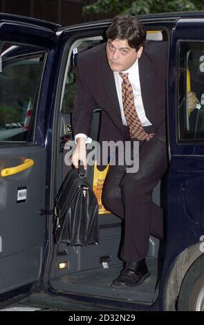 Former MI5 employee David Shayler arrives at the Old Bailey in central London,  for the first day of the trial where is being taken to court by the British government under the Official Secrets Act.  Stock Photo