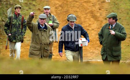The Duke of Edinburgh during a visit to a clay pigeon shooting competition organised by the British Association of Shooting and Conservation on the royal Sandringham Estate near Kings Lynn, Norfolk. Newspaper reports had suggested that the Duke, 81,   *..was sporting black eyes and cuts, but he appeared in good spirits as he chatted to association officials and at one time, asked reporters 'Do I look ill?' Stock Photo