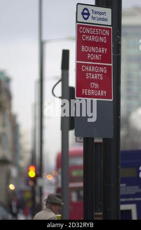 A sign indicates the boundary of the congestion charging zone in central London that is being introduced February 17. Motorists will be charged 5 per day if they drive in the zone Monday to Friday 7am to 6. 30pm. * The system will be administered by a network of camera connected to an Automatic Number Plate Recognition (ANPR) computer system.Drivers will be able to pay by telephone, post, internet, or in person at a retail outlet, and there is a discount for those who live within the charging zone. Taxis, licenced minicabs, emergency services vehicles, buses, blue/orange badge holders, are Stock Photo