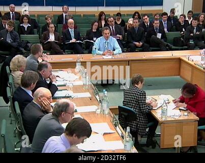 EDITORIAL USE ONLY : British Prime Minister Tony Blair ( blue shirt - centre) takes  questions from the 35 chairs of House of Commons Select Committees.     *  The Liaison Committe, as the group is called, consists of leading backbench MPs who were expected to quiz Mr Blair on issues including Iraq and European enlargement.  Stock Photo