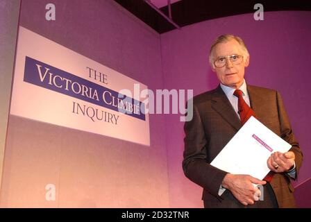 Lord Laming with a copy of the report gives a statement during a press conference in central London, concerning murdered child Victoria Climbie. The report of an inquiry into her death was published today. 26/11/2003 Lord Laming with a copy of the report concerning murdered child Victoria Climbie, during a press conference in London, January 28, 2003. The man who chaired an inquiry into the horrific death of eight-year old Victoria Climbie was outlining today how similar tragedies could be averted. Victoria died after being abused and tortured by her great aunt Marie Therese Kouao and Kouao's Stock Photo