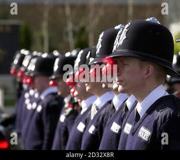 Police recruits wearing red noses in a rehearsal for their passing out parade at Hendon Training School, North London. Stock Photo